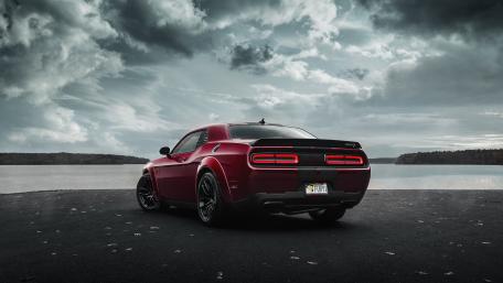 Dodge Challenger SRT Rear View Under Stormy Lakeside Skies 4K wallpaper
