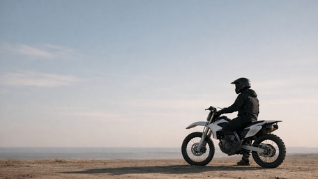 Lone Desert Rider on Adventure Motorcycle at Dawn wallpaper