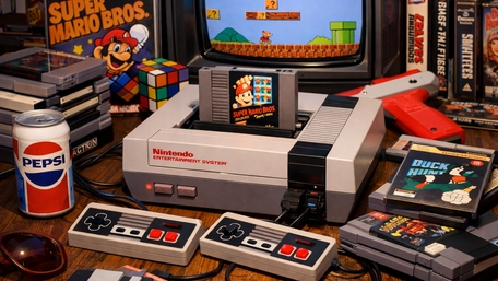 Retro Nintendo Gaming Desk with Classic Cartridges and Controllers wallpaper
