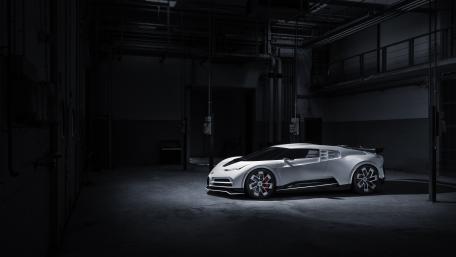 Monochrome Bugatti Centodieci Supercar in Shadowed Industrial Garage wallpaper