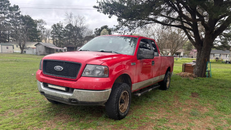 Red Ford Pickup in Rustic Yard wallpaper