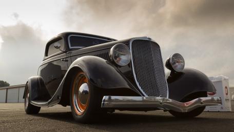 Vintage Ford Hot Rod Under Dramatic Skies wallpaper