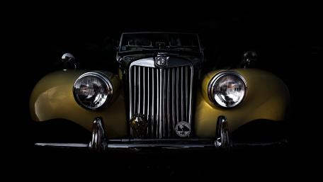 Classic MG Elegance in Shadowy Front View wallpaper