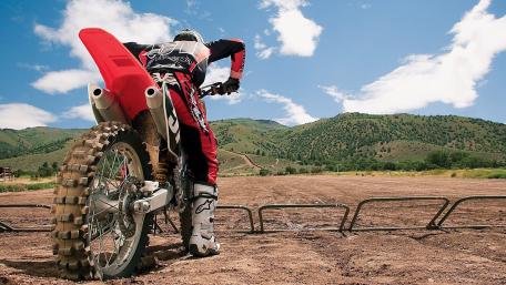 Motocross Rider Ready for Off Road Action wallpaper