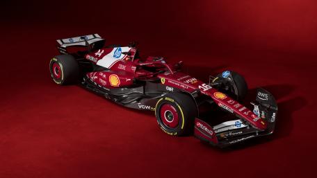 Dynamic Ferrari SF-25 on a Bold Red Background wallpaper