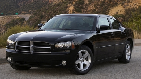 Black Dodge Charger on Scenic Road wallpaper