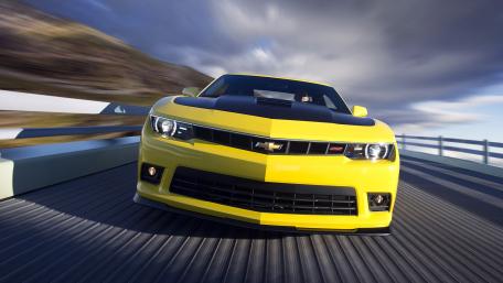 Yellow Chevrolet Camaro Racing Through Motion Blur wallpaper