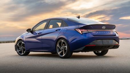 Sleek Hyundai Elantra Sunset Drive wallpaper