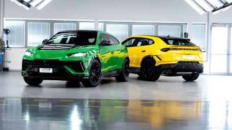 Dual Lamborghini Urus Showroom Brilliance wallpaper