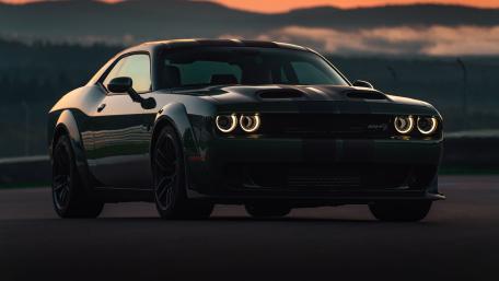 Dusk Power of a Black Dodge Challenger wallpaper