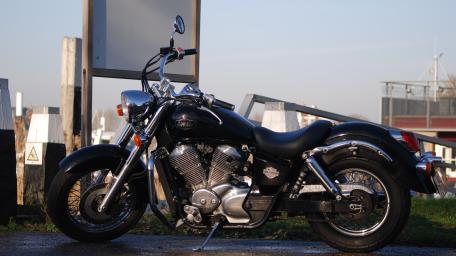 Classic Harley Sportster by the Harbor wallpaper