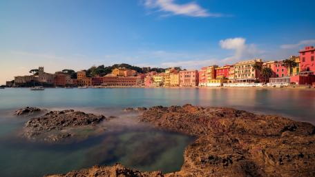 Colorful Coastal Charm in Baia del Silenzio wallpaper