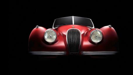 Elegant Red Classic Roadster wallpaper