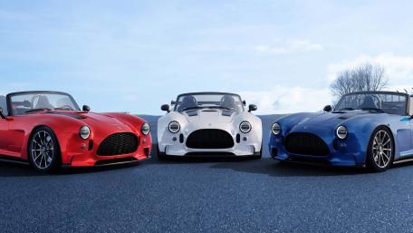 Classic Cobra Roadsters in Bold Colors wallpaper