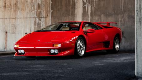 Red Lamborghini Diablo in Moody Garage wallpaper