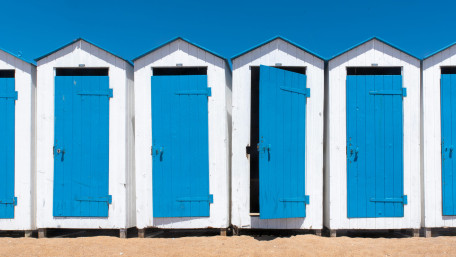 Coastal Beach Huts in Bright Blue wallpaper