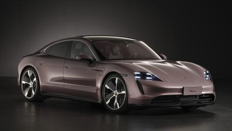 Porsche Taycan Electric SUV in Sleek Studio Glow wallpaper