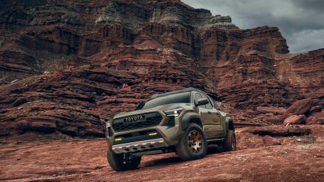Rugged Toyota Tacoma Conquers Red Rock Terrain wallpaper