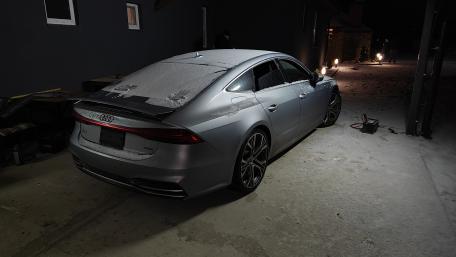 Sleek Audi A7 in Winter Setting wallpaper
