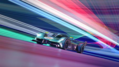 Aston Martin Valkyrie Racing Through Neon Speed wallpaper