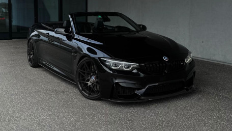 Sleek Black BMW F83 Convertible Wallpaper wallpaper