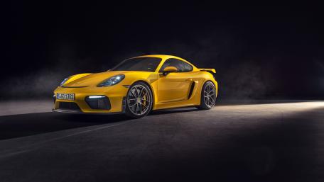 Yellow Porsche 718 Cayman GT4 Spotlight wallpaper