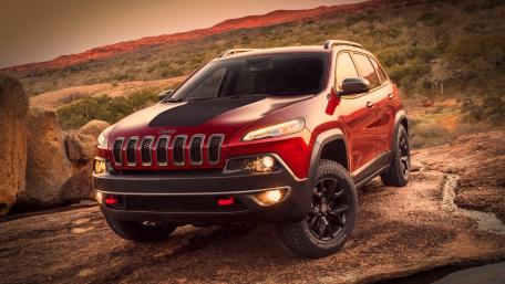 Jeep Cherokee Trailhawk on Desert Rocks wallpaper