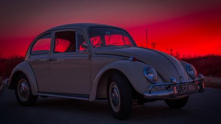Vintage Volkswagen Beetle at Crimson Sunset wallpaper