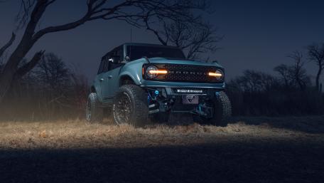 Ford Bronco Under Moonlit Trees wallpaper
