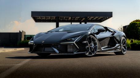 Sleek Lamborghini Revuelto Under Golden Light wallpaper