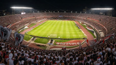 Electric Night Match in a Packed Soccer Stadium wallpaper