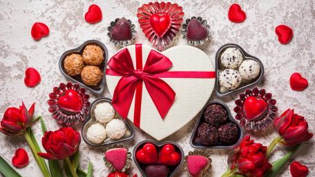 Valentine's Day Delight Red Flowers and Sweet Treats wallpaper