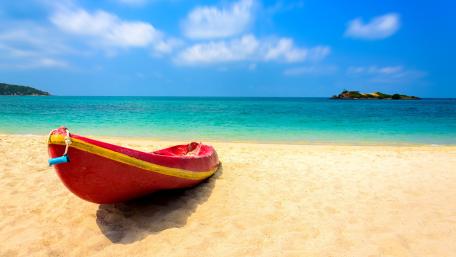 Red Boat on Sunny Tropical Shore wallpaper