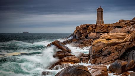 Ploumanac'h Lighthouse on the Pink Granite Coast wallpaper