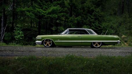 Classic Green Impala in Forest Silence wallpaper