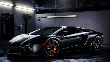 Sleek Black Lamborghini Aventador wallpaper
