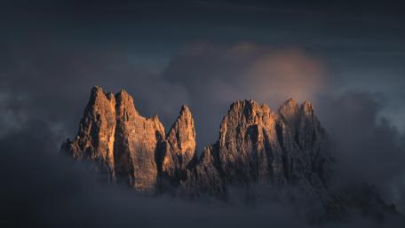 Alpine Peaks Rising Through Mist wallpaper