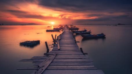 Golden Sunset Over the Quiet Pier wallpaper