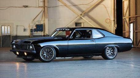 Sleek Chevrolet Nova In Industrial Garage wallpaper