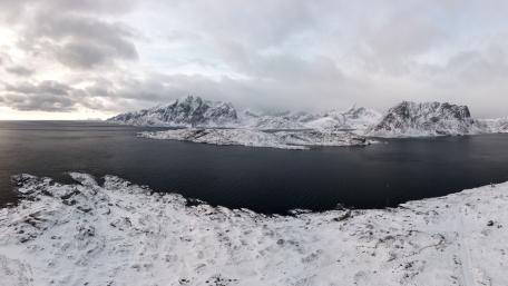 Panoramic View of Snowy Bay Lofoten Norway wallpaper