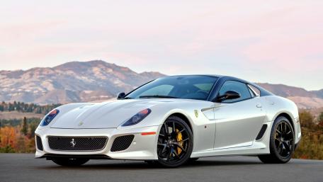 Elegant White Ferrari 599 GTO on Scenic Road wallpaper