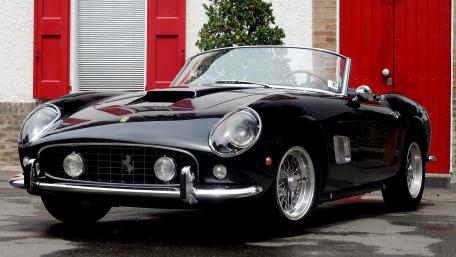 Vintage Ferrari Roadster in Bold Black wallpaper