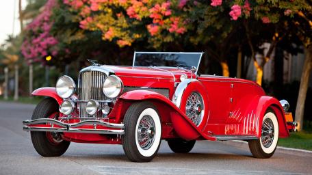 Classic Red Duesenberg Roadster wallpaper