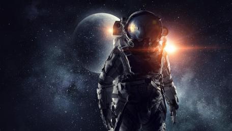 Lone Astronaut Before Distant Worlds wallpaper
