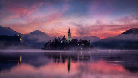 Dreamy Lake Sunrise Over Mountain Island wallpaper