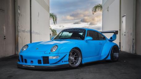 Blue Porsche 911 Carrera Widebody wallpaper