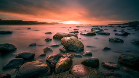Golden Hour Stones by the Sea wallpaper
