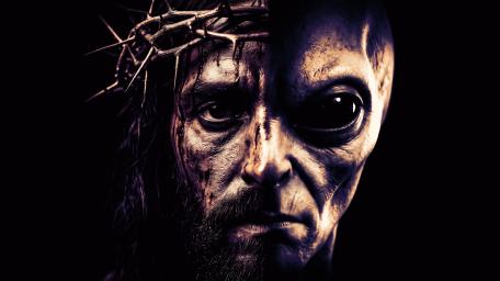 Alien Messiah in Shadowed Splendor wallpaper