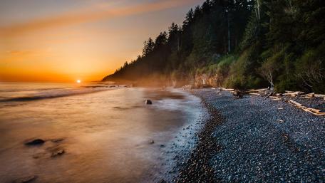 Golden Pebble Coast at Sunset wallpaper