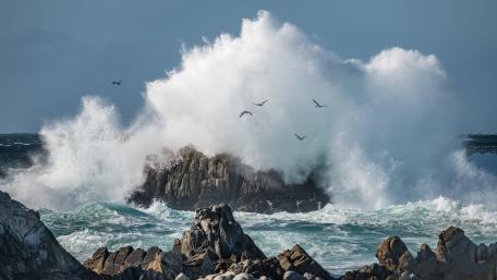 Storm Waves Over Rocky Coast wallpaper